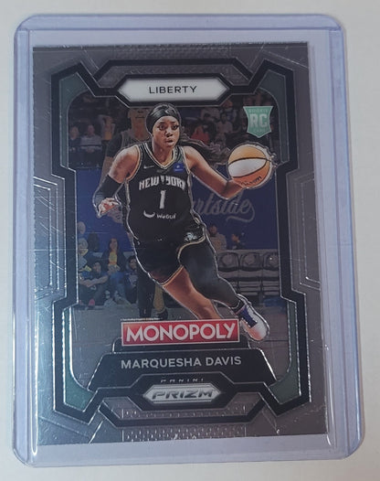 Basketball trading card of Marquesha Davis with Monopoly branding on a gray background