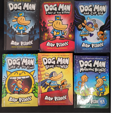 Set of six 'Dog Man' books by Dav Pilkey on a black background