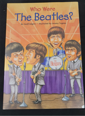 Book cover of 'Who Were The Beatles?' with illustrations of the band members.