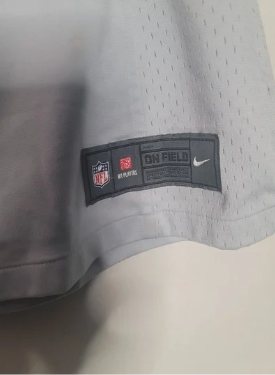 Gray Seattle Seahawks jersey with NFL and Nike logos on a plain background