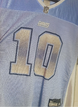 Eli Manning jersey with number 10 and 'Giants' branding