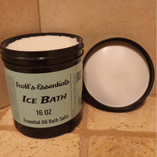 Container of Scott's Essentials Ice Bath Essential Oil Bath Salts on a tile surface