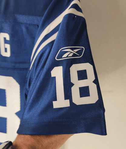 Peyton Manning jersey with number 18 and Reebok logo on right sleeve